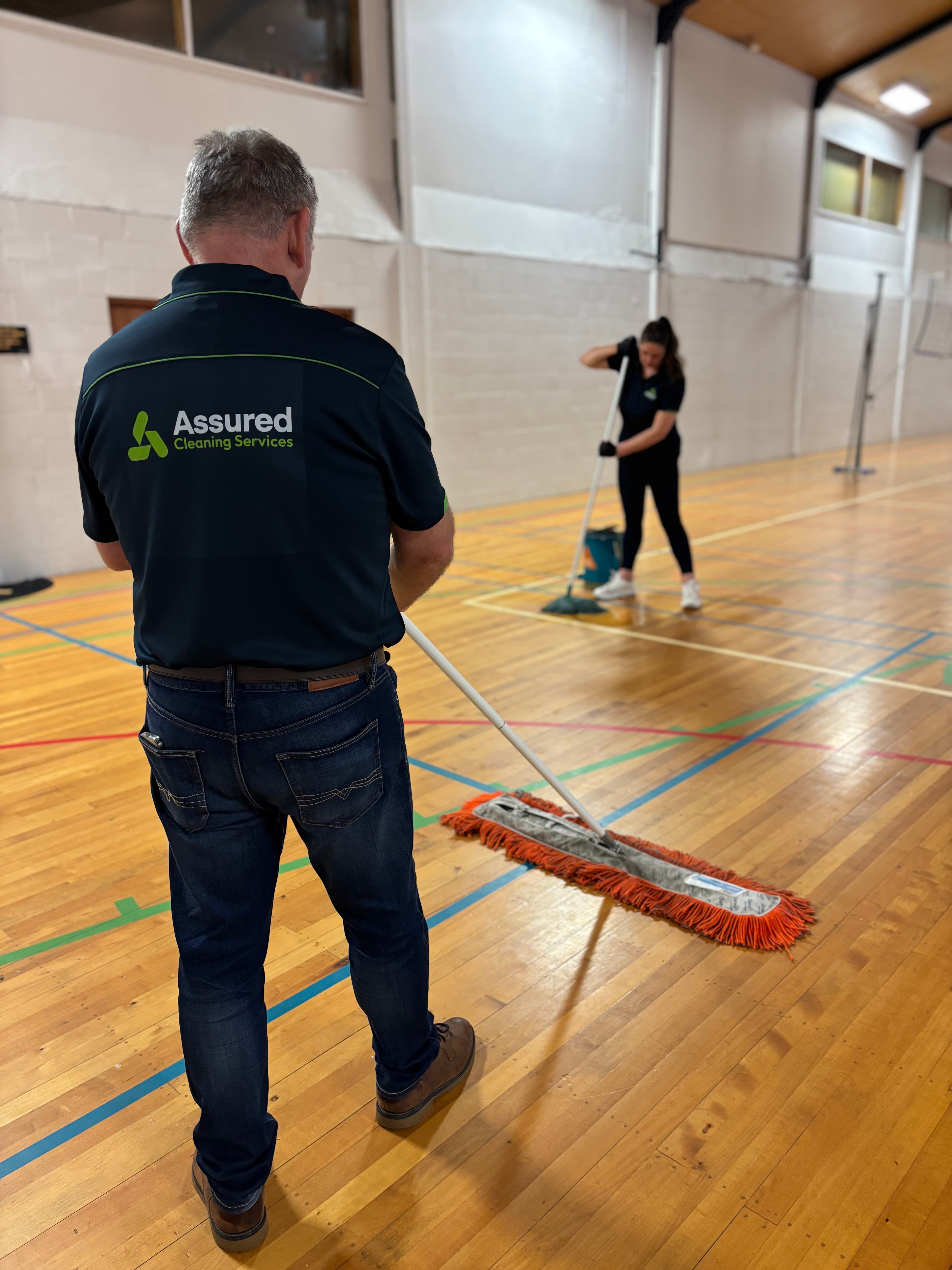 Assured Cleaning Services team — Holly Fisher and staff in Tauranga